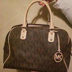 Aunthentic Classic MK print leather bag.